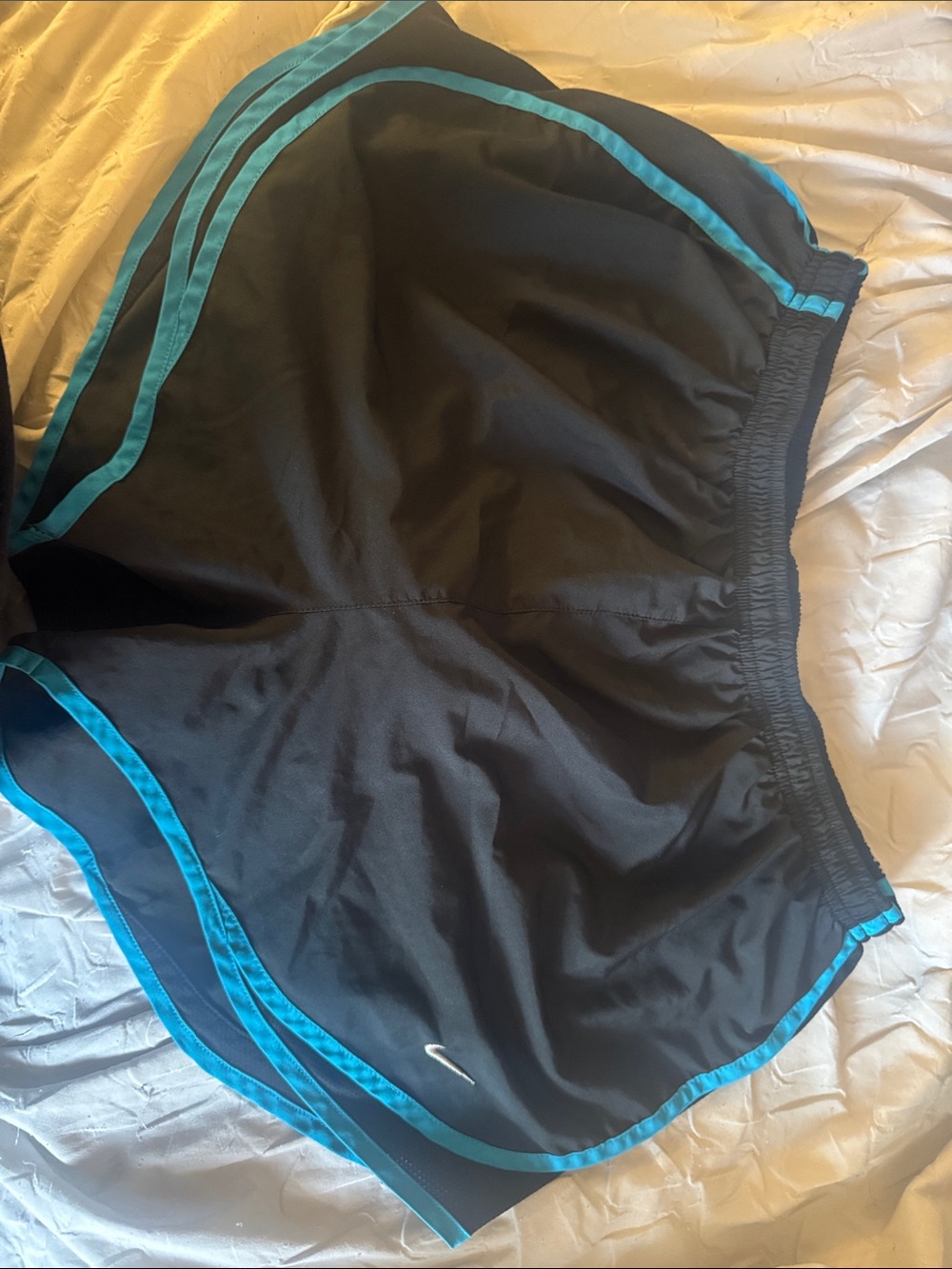 Nike Women's Black Athletic Shorts with Teal Trim